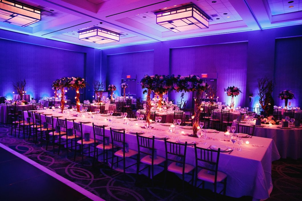 Elegant social event hall décor with flowers and luxury styling