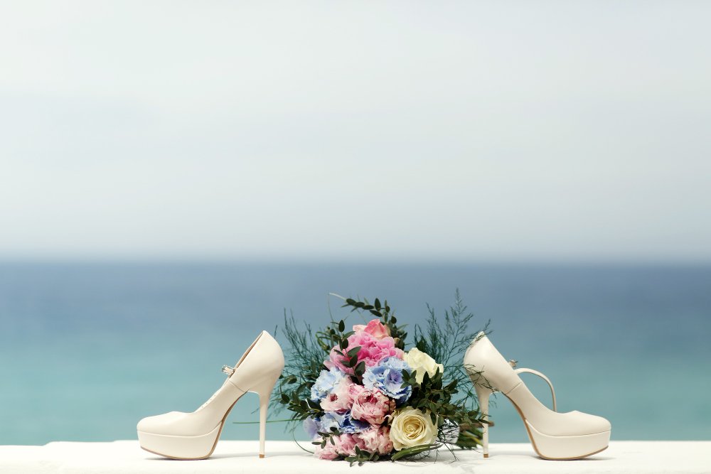 Romantic proposal arrangement with candles and florals